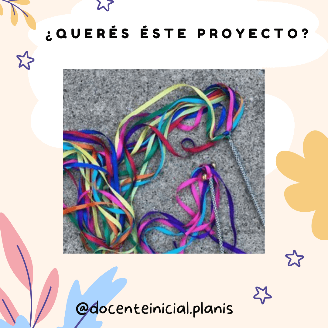 Lazos de colores enredados sobre una superficie gris Se observan cintas finas de muchos colores amontonadas y entrelazadas sobre un fondo gris, como material de manualidad o decoración.